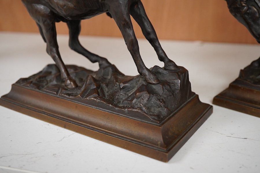 After Paul Aichele (1859-1910), a pair of bronze figures of Arab boys riding donkeys, 23cm